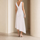 Pink asymmetric midi dress diagonal-cut hemline detail, back close-up by Jil Sander