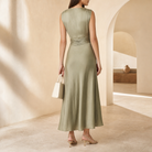 Sage green midi dress sleeveless back construction, close-up back view
