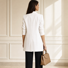 White longline blazer by Lord & Taylor Heritage, back view showing tailored shoulders
