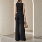 Black waistcoat jumpsuit back view showing structured shoulders by Lord & Taylor Heritage