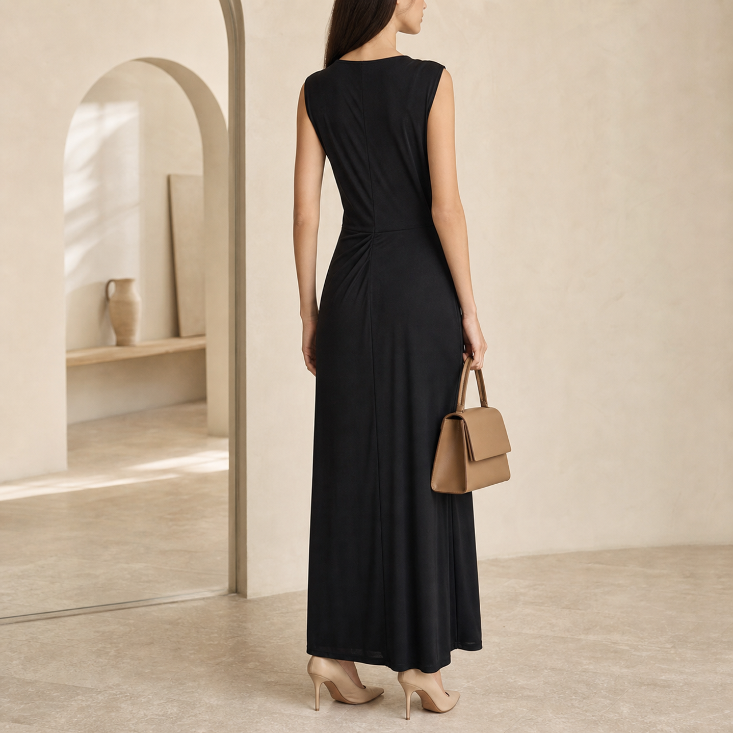 Black sleeveless maxi dress by Lord & Taylor Heritage, back view showing draping detail