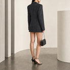 Black wool mini blazer dress by Alexander Wang, back detail