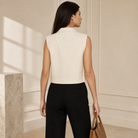 Beige sleeveless vest back view showing structured shoulders by Lord & Taylor Heritage