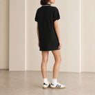 Black polo mini dress by T by Alexander Wang, back detail close-up