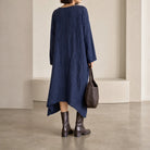 Black Spicchi midi dress showing asymmetrical hem by DANIELA GREGIS, back detail