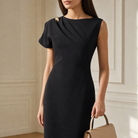 Black midi dress front detail showing gold-tone hardware and draped shoulder by Lord & Taylor Heritage