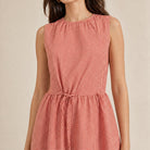 Red checkered sleeveless dress by APUNTOB, front detail view