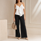 Black wide-leg trousers with high-rise waist, front detail by Lord & Taylor Heritage