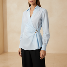 Powder blue wrap blouse front detail showing gold-tone buttons and V-neckline by Lord & Taylor Heritage