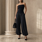 Black balloon-hem trousers with front pleats, close-up detail by Lord & Taylor Heritage