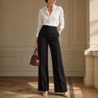 Black high-waisted wide-leg trousers with tailored waistband, front detail by Lord & Taylor Heritage