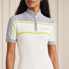 White polo shirt dress front detail showing gray trim and neon yellow piping by Casablanca