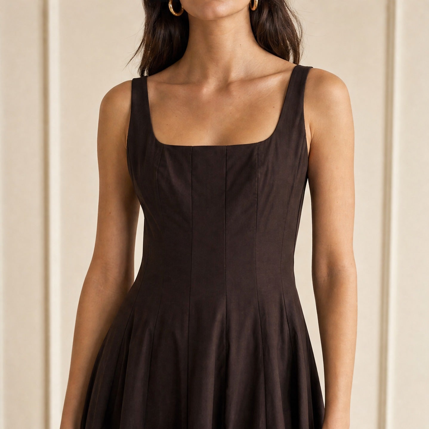 Brown STAUD Wells midi dress, close-up of structured bodice and scoop neckline