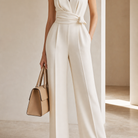 Cream wrap jumpsuit front detail showing V-neckline and self-tie waist by Lord & Taylor Heritage