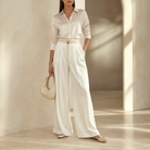 Champagne satin trousers by Lord & Taylor Heritage, full-length side angle on model