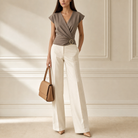 Beige wrap top with hexagon buckle by Lord & Taylor Heritage, full-length front view on model