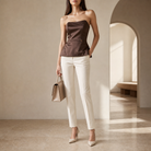 Brown strapless satin peplum top with gold belt by Lord & Taylor Heritage, full length on model