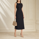 Black sleeveless midi dress with bow shoulder by Lord & Taylor Heritage, full length front view