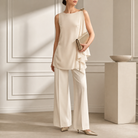 Beige full-length dress on model, side angle by Lord & Taylor Heritage
