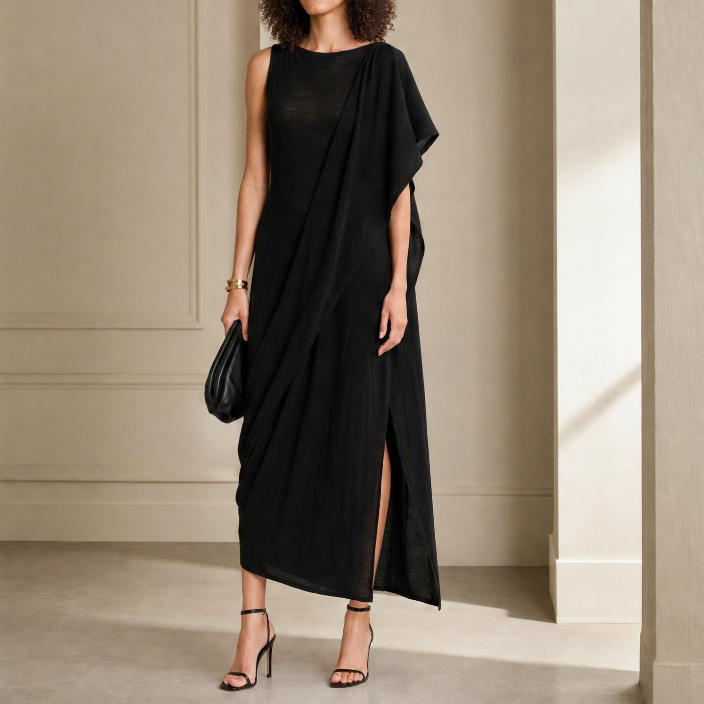 Black PALOMA WOOL sleeveless midi dress with asymmetric drape, full body front view