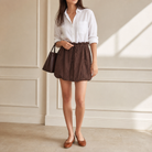 Chocolate brown bubble mini skirt with paperbag waist by Lord & Taylor Heritage, full-length view