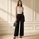 Beige sequin scallop two-piece evening set with black wide-leg trousers by Lord & Taylor Heritage, full length