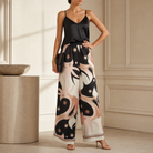 Black multi print palazzo trousers on model, full length front view by Lord & Taylor Heritage