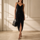 Black sequin wrap midi dress with V-neckline by Lord & Taylor Heritage, full-length front view