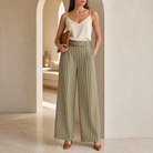 Olive striped wide-leg trousers by Lord & Taylor Heritage, side view on model