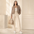Taupe metallic satin bomber jacket by Lord & Taylor Heritage, full-length front view on model