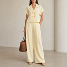 Yellow linen blend camp shirt by Lord & Taylor Heritage, full-length front view on model