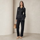 Black satin wrap blouse on model full length by Lord & Taylor Heritage