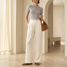 Champagne satin wide-leg trousers by Lord & Taylor Heritage, full-length front view on model