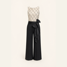 Beige sequin top and black wide-leg trousers two-piece set, flat lay by Lord & Taylor Heritage