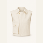 Cream utility vest flat lay product shot by Lord & Taylor Heritage