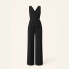 Black wide-leg jumpsuit with asymmetric wrap hem by Lord & Taylor Heritage, flat lay