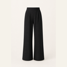 Black wide-leg trousers flat lay product shot by Lord & Taylor Heritage