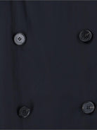 Dark grey Veyron coat showing side pockets and belt, side view by The Frankie Shop