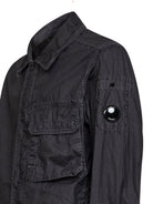 Black wax overshirt by C.P. Company with ventilation panel, back view