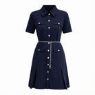 Navy scuba mini dress with chain belt by Michael Kors, flat lay view