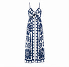 Navy and white floral maxi dress by FARM Rio, flat lay view