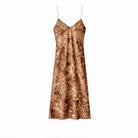 Green animal print slip dress by BA&SH, flat lay view