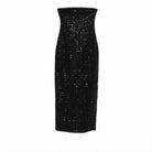 Black beaded maxi dress with strapless construction by ROTATE BIRGERCHRISTENSEN, flat lay view