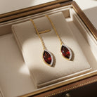 Red garnet threader earrings with diamonds in 14k yellow gold by Lord & Taylor, front view